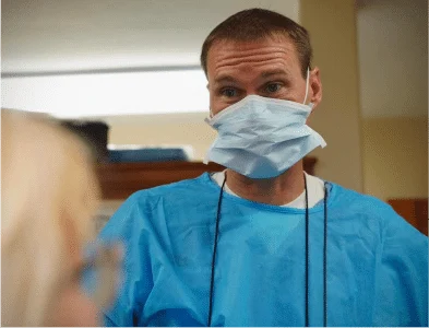 Dr. Eric talking to a patient