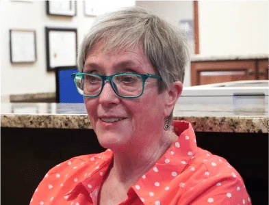 Jen is smiling after her dental work.